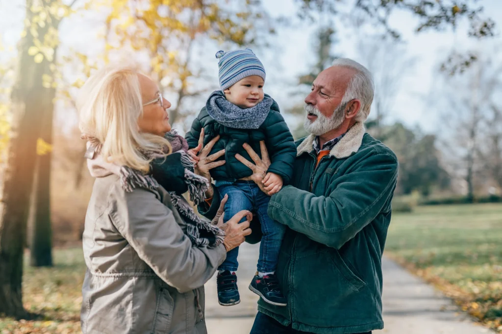 Grandparents spending quality time with their 	grandchild.